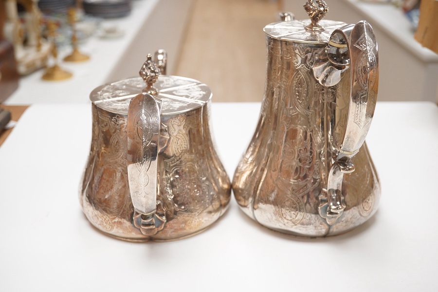 A Victorian engraved silver teapot and matching coffee pot, by George Ivory, London, 1857, gross weight 46.2oz. CITES Submission reference 4K2AZFRW. Condition - fair to good